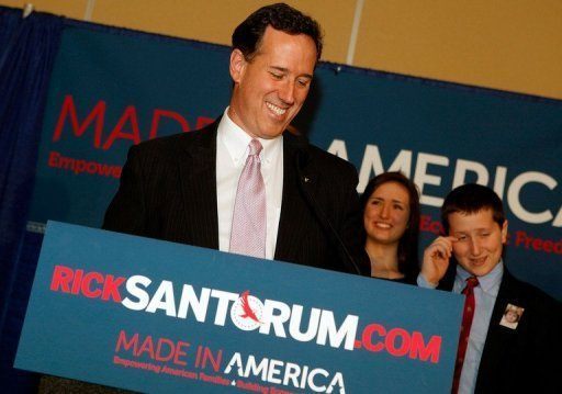 Santorum Happy at Podium
