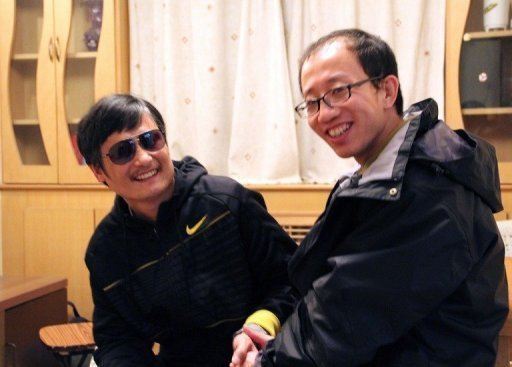 Activist Hu Jia With the Blind Lawyer in Sunglasses