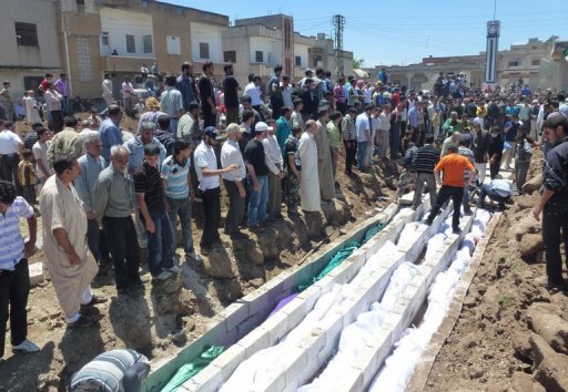 Mass Burial Following Houla Massacre