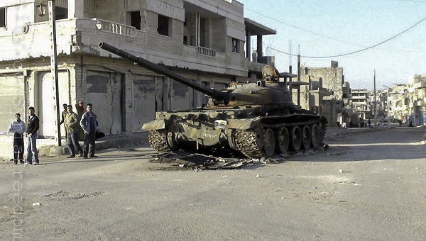 Syria Tank Destroyed on Street w Onlookers