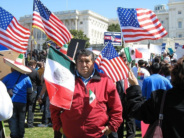 Latino Candidates in State Legislatures Protestor w Flags