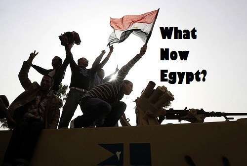 Protesters in Tahrir Square what now egypt graphic flag