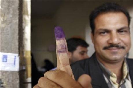 Elections for Iraq's Sunni Provinces man dyed finger