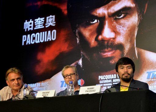 Philippine boxer Pacquiao too young to run